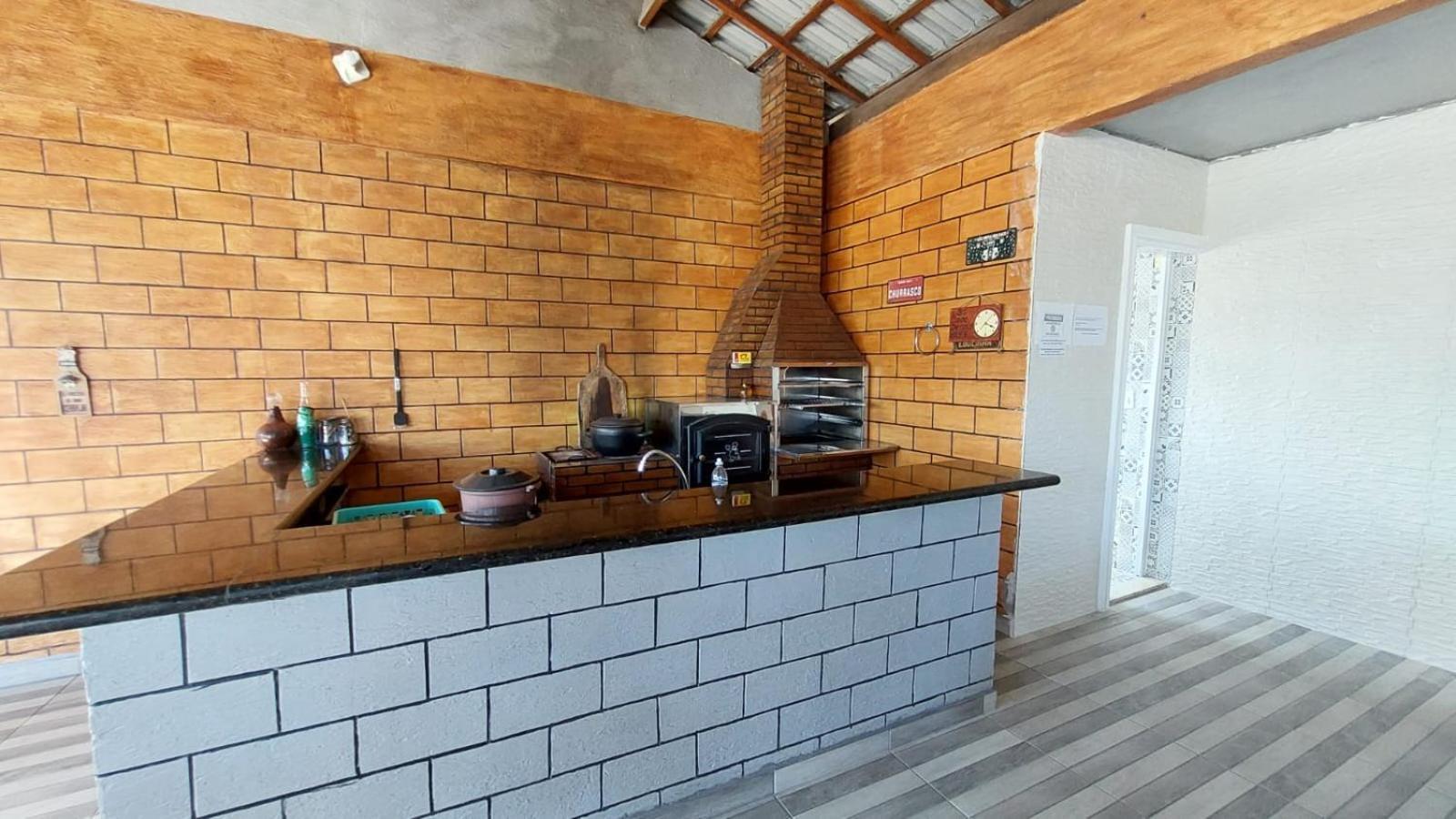 Suites 500M Praia Da Enseada Гуаружа Экстерьер фото
