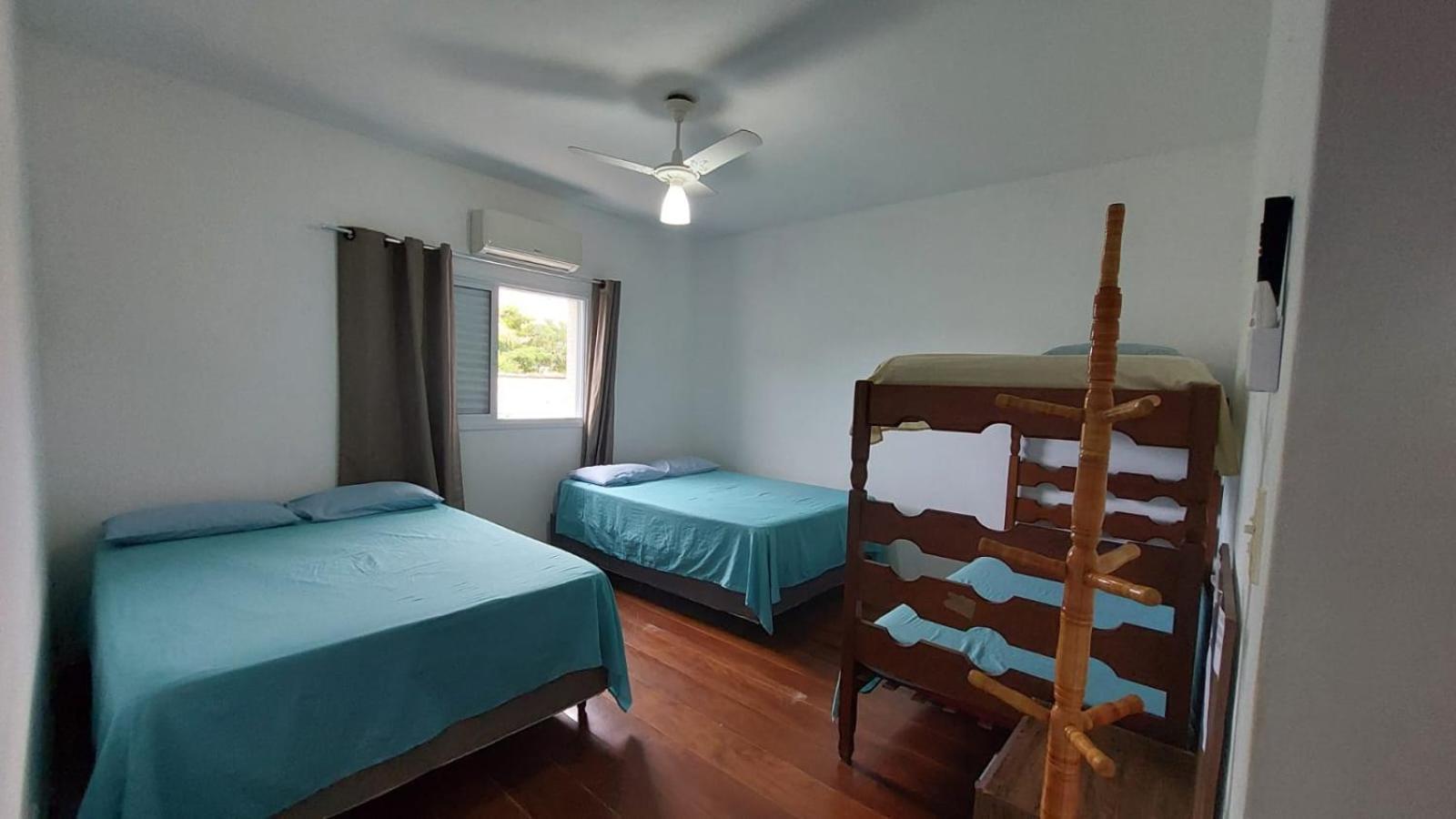 Suites 500M Praia Da Enseada Гуаружа Экстерьер фото