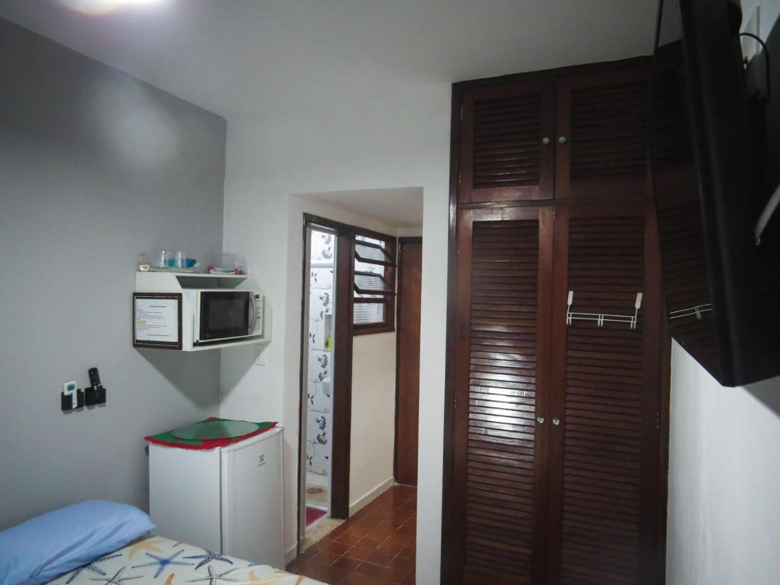Suites 500M Praia Da Enseada Гуаружа Экстерьер фото