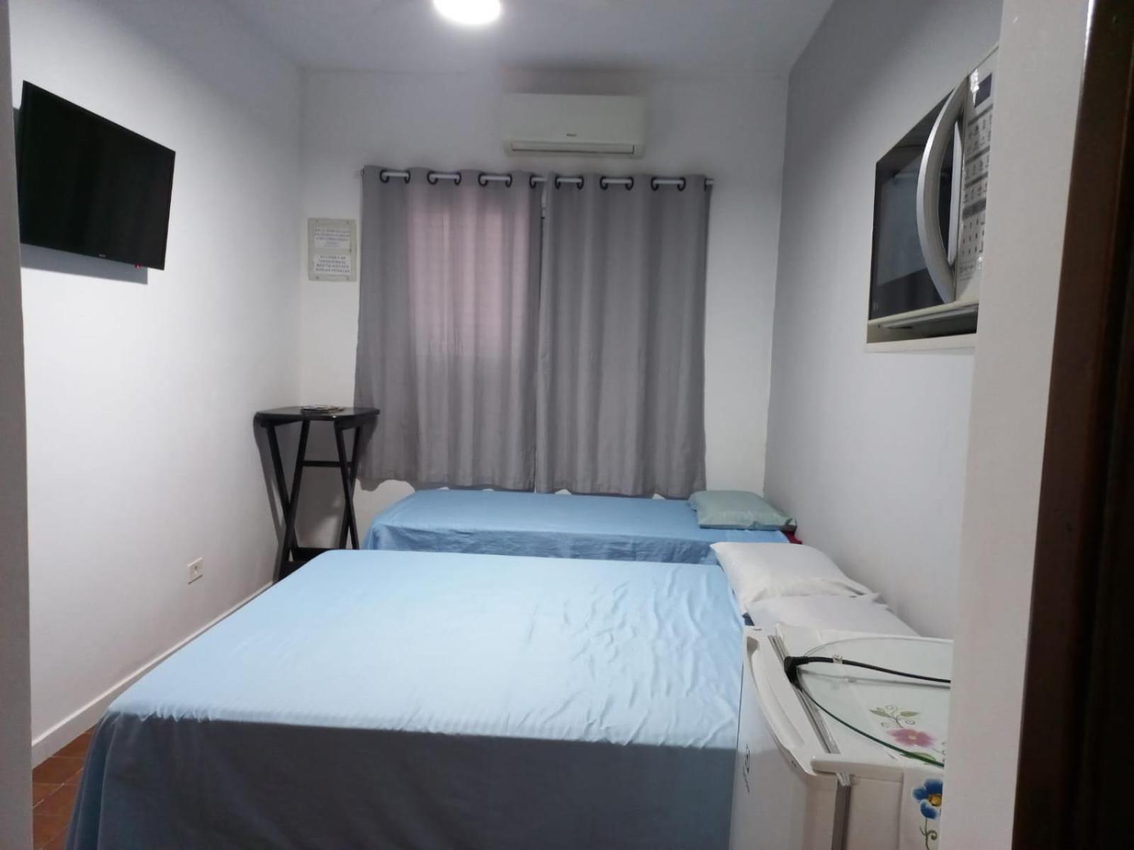 Suites 500M Praia Da Enseada Гуаружа Экстерьер фото